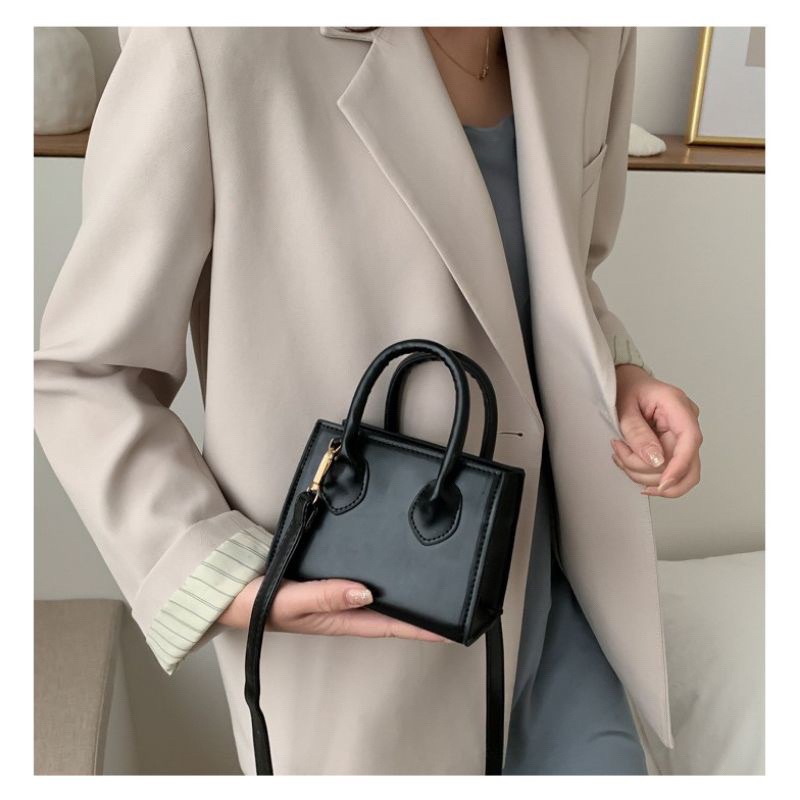 Túi xách nữ đeo chéo da trơn phong cách hàn quốc 2 quai cầm tay.