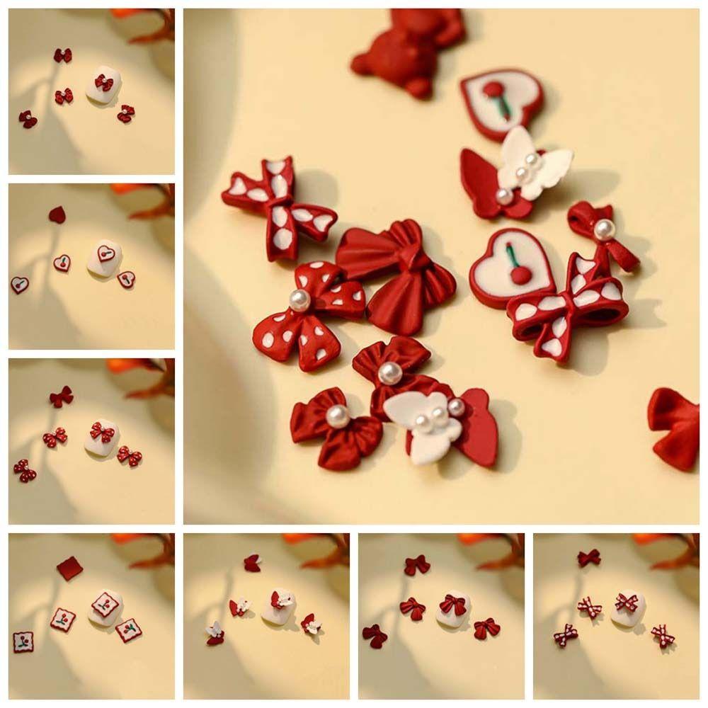 Bộ 5 Phụ Kiện Trang Trí Móng Tay Hình Nơ Màu Đỏ Đục Đính Đá Charm Năm Mới