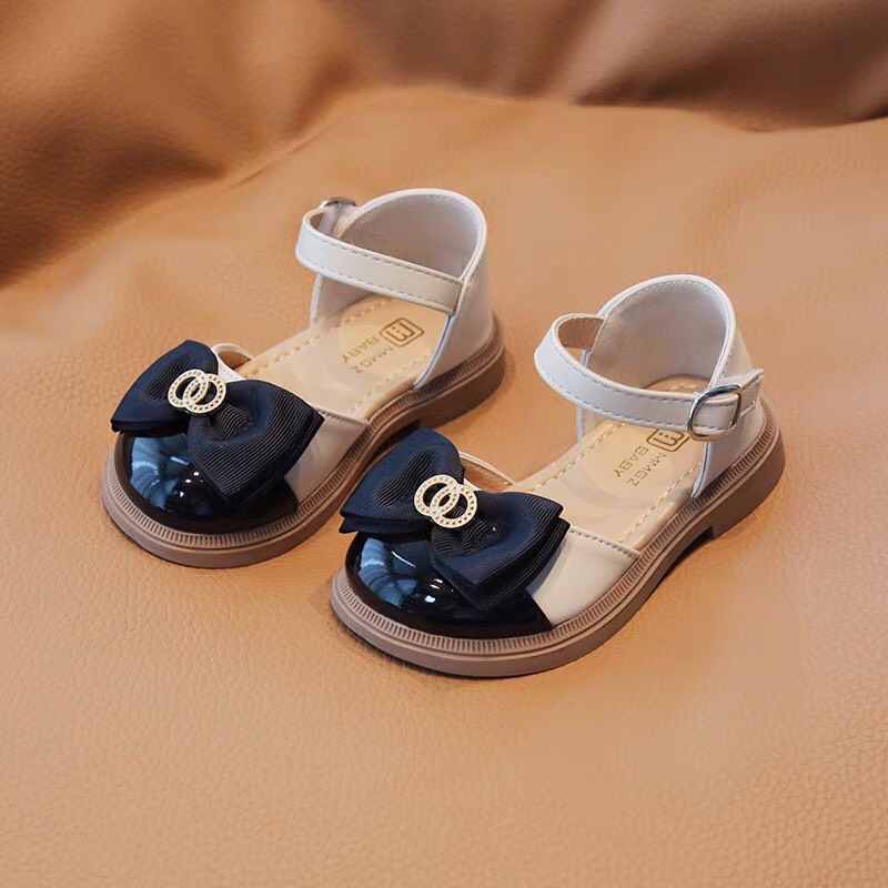 Sandal bít mũi đính nơ gắn 2 vòng tròn xinh xắn cho bé gái - Dép quai hậu công chúa phong cách cổ điển cho bé v783