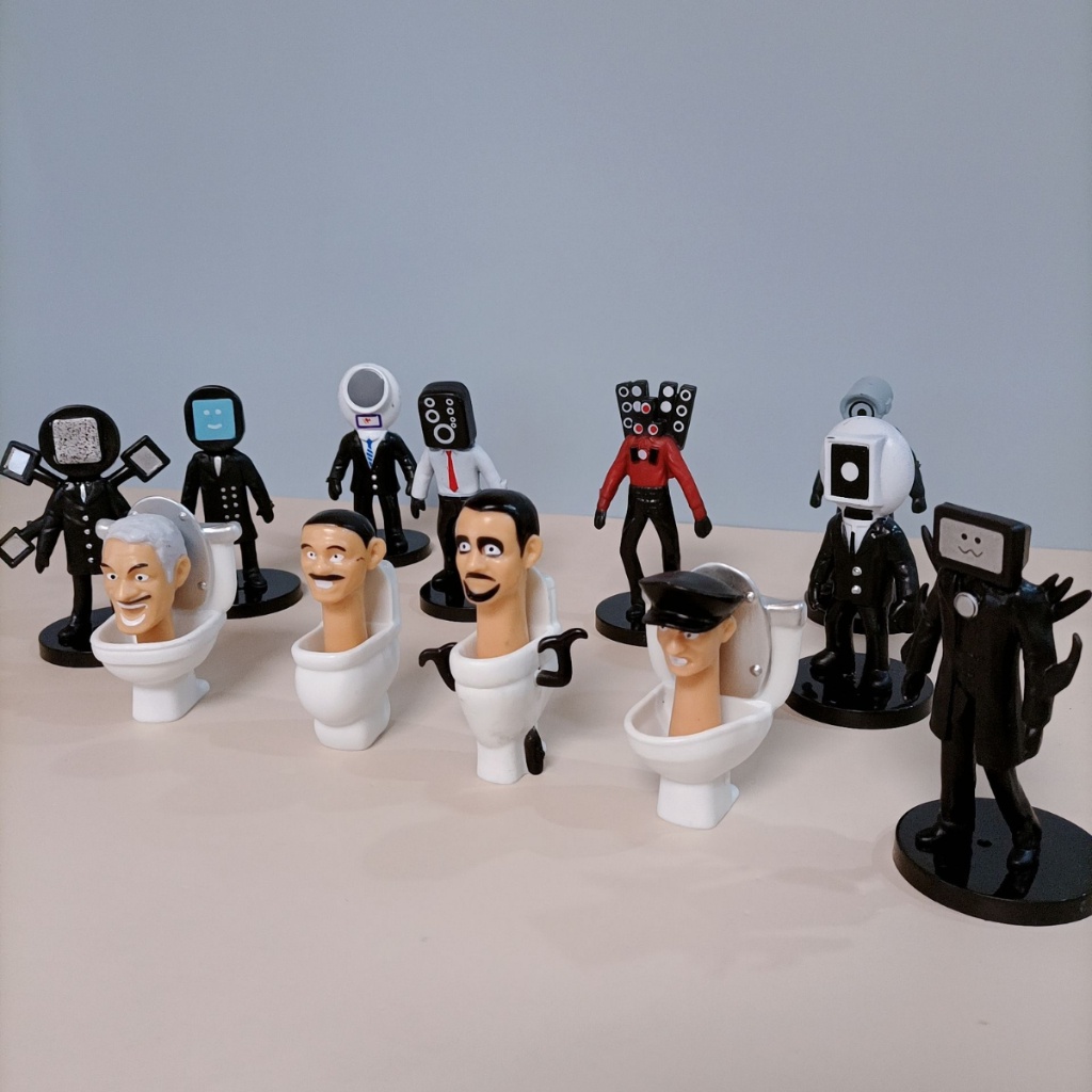 Mô Hình Đồ Chơi Skibidi Toilet Wooti Mô Phỏng Skibidi Bồn Cầu Titan Man Làm Quà Tặng Cho Bé Chất Liệu Nhựa An ToàTặng ô