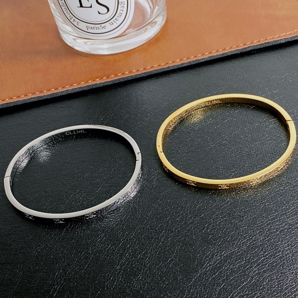 Triumph Vòng Tay Thép Titan Mạ Vàng In Chữ Đơn Giản Dễ Phối Đồ Thời Trang Cho Nữ