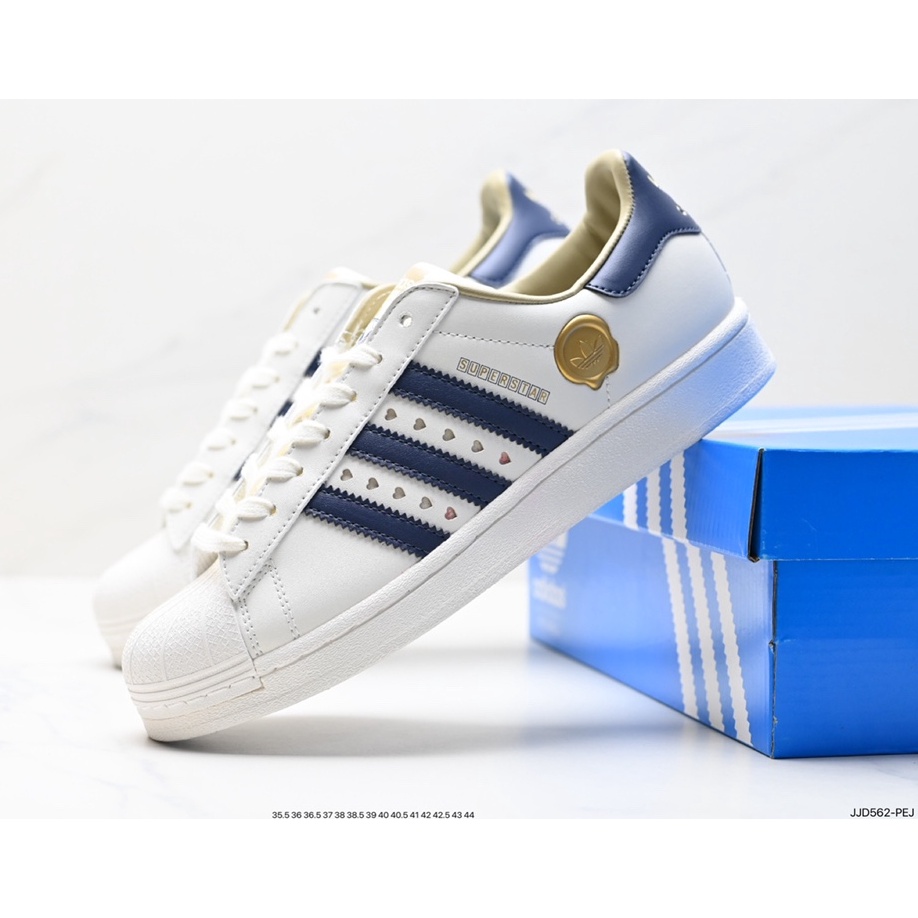 Giày Thể Thao Adidas Clover Superstar Pride RM Shell Series Cổ Thấp Màu Trắng / Xanh Dương Kiểu Dáng Đơn Giản Năng Động Thời Trang