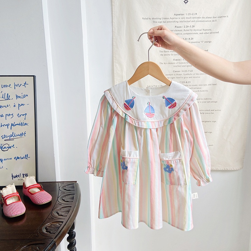 Cô gái váy trẻ em dài tay váy cổ tròn váy dệt kim áo chui đầu cho bé váy mùa thu trẻ em mặc