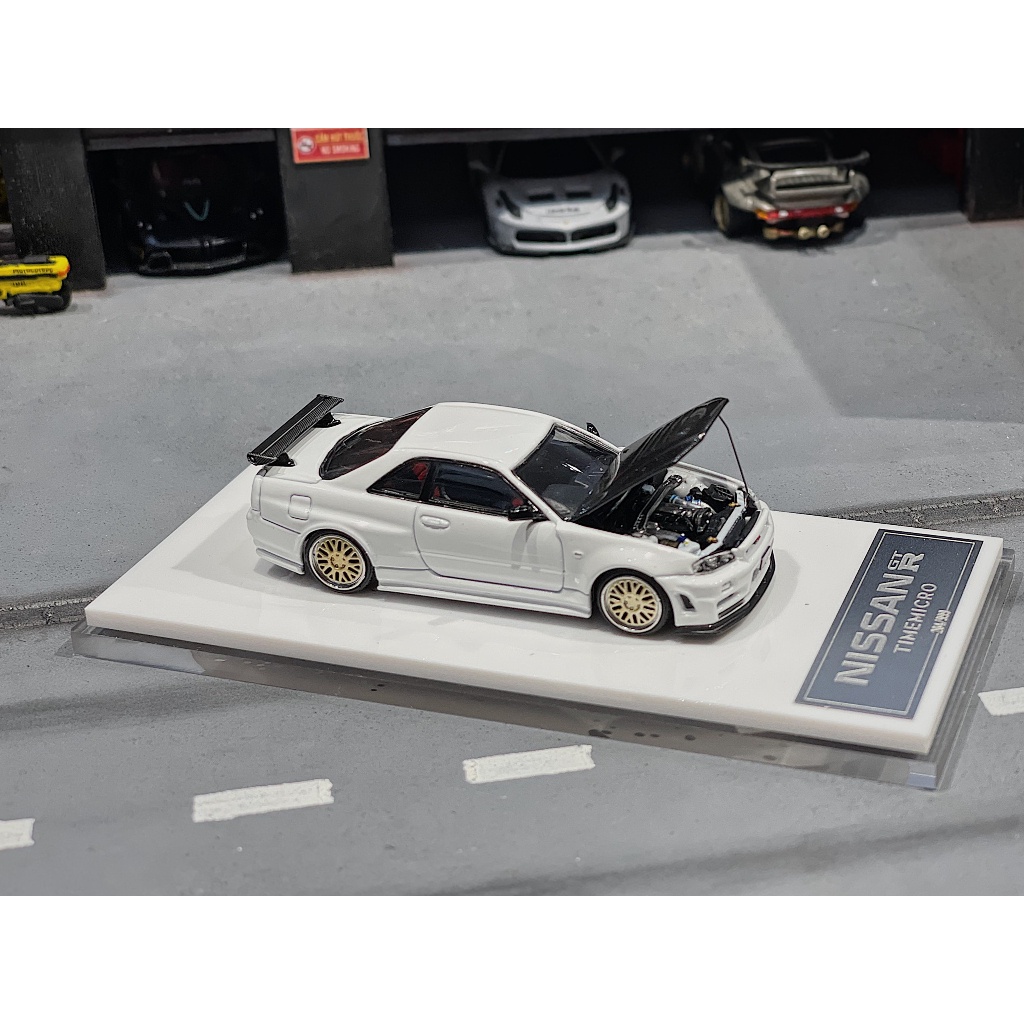 XE MÔ HÌNH NISSAN R34 X FIGURE WHITE,TỶ LỆ 1/64 MICROTIME