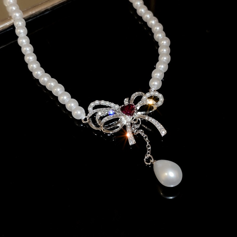 Dây Chuyền Mặt Nơ Đính Ngọc Trai Sang Trọng Cho Nữ