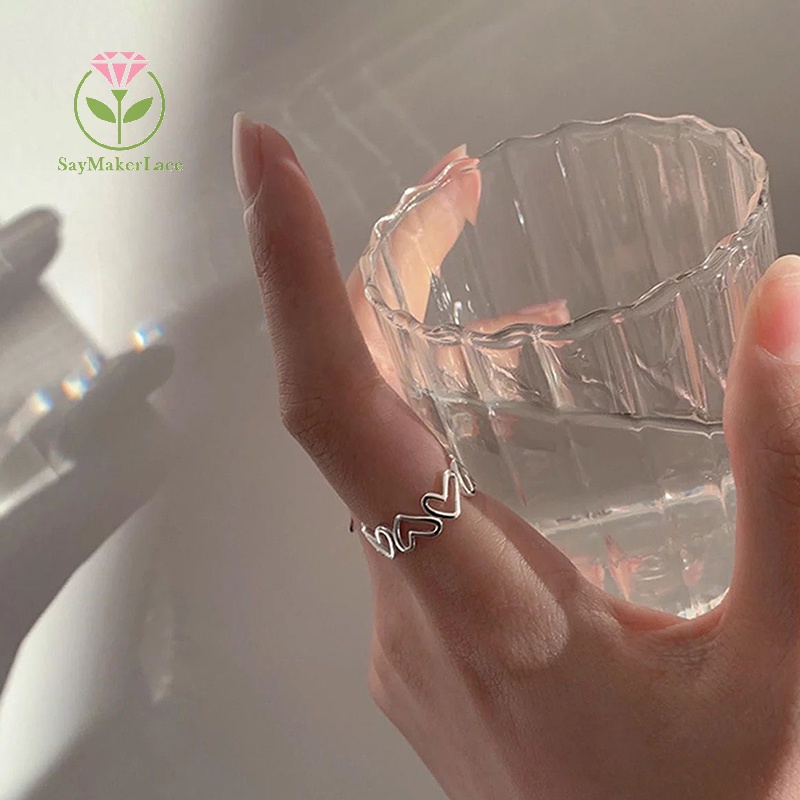 Set nhẫn SayMakerLace hình trái tim rỗng màu bạc đơn giản cá tính chỉnh được