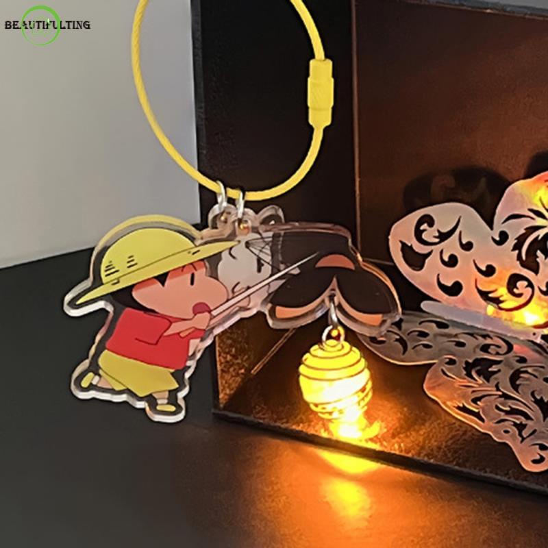 CraMóc khóa Shin lồng đèn Trung Thu hình đom đóm đi chơi bên ánh đèn vàng treo balo gắn chìa khóa lung linh cute dễ thương