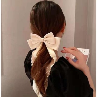 Lucy -kẹp tóc nơ tiểu thư có dây dài .