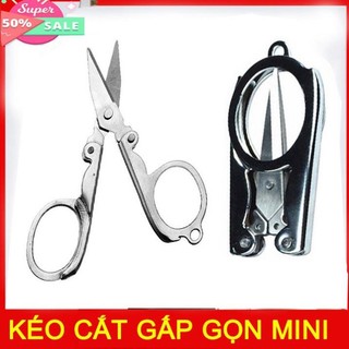 Kéo gấp gọn mini bỏ túi khi đi du lịch