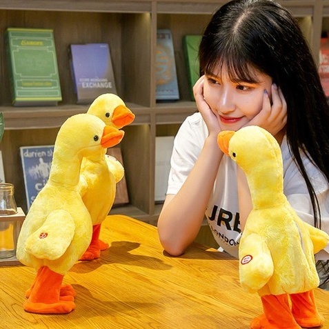 Đồ chơi nhồi bông vịt poka nhại giọng nói biết đi có 120 bài hát pin sạc usb tiện lợi,