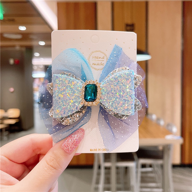 Kẹp Tóc Nơ Ruy Băng Lưới Tuyết Pha Lê Xanh Dương Công Chúa Tuyết Mới Cho Bé Gái