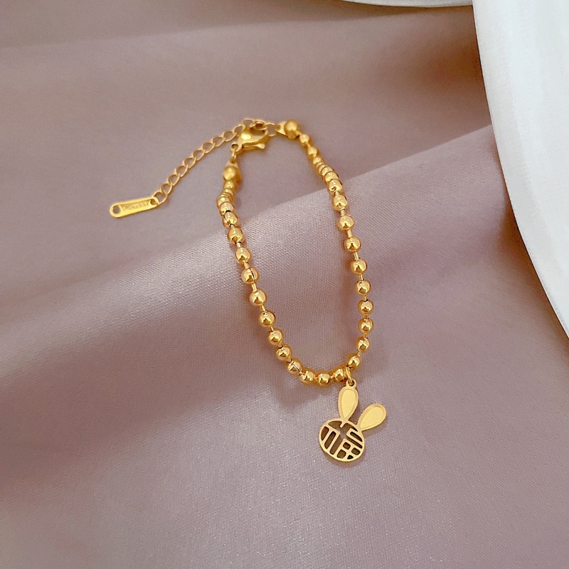 Vòng tay titan không gỉ dạng bi tròn mạ vàng 18k thiết kế mặt chữ phúc hình tai thỏ dễ thương dành cho nữ