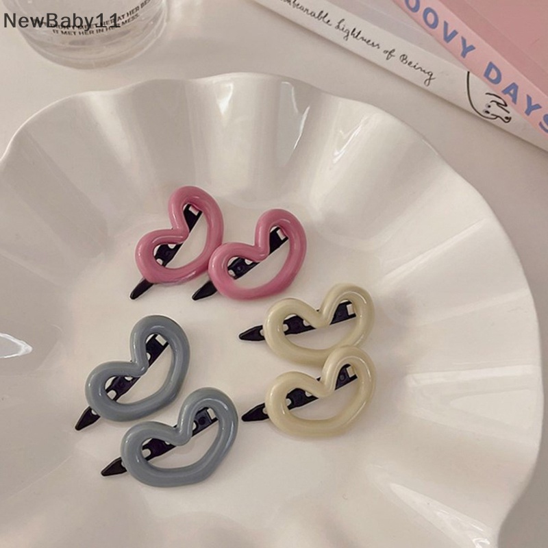 Bộ 2 Kẹp Tóc Màu Trơn Hình Nơ Trái Tim Dễ Thương Phong Cách Hàn Quốc Cho Nữ