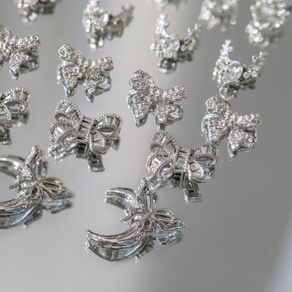 Bộ 5 Phụ Kiện Trang Trí Móng Tay Hình Nơ Đính Đá 3d Bằng Hợp Kim Màu Bạc Xinh Xắn