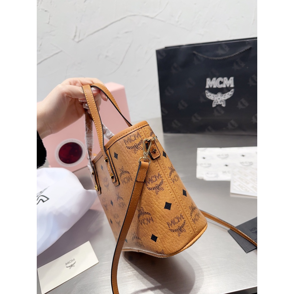 MCM star same dish basket bag fashion trendy essential item metal zipper printed canvas women's bag