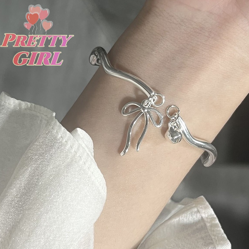 Vòng Tay Hở Mặt Hình Nơ Đơn Giản Nhẹ Nhàng Với Chuông Trang Sức Đi Tiệc