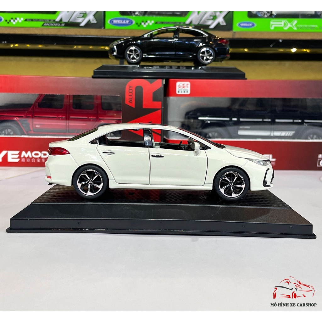 Mô hình xe kim loại Toyota Corolla Altis tỉ lệ 1:32 Carshop hãng CHEZHI 2 màu