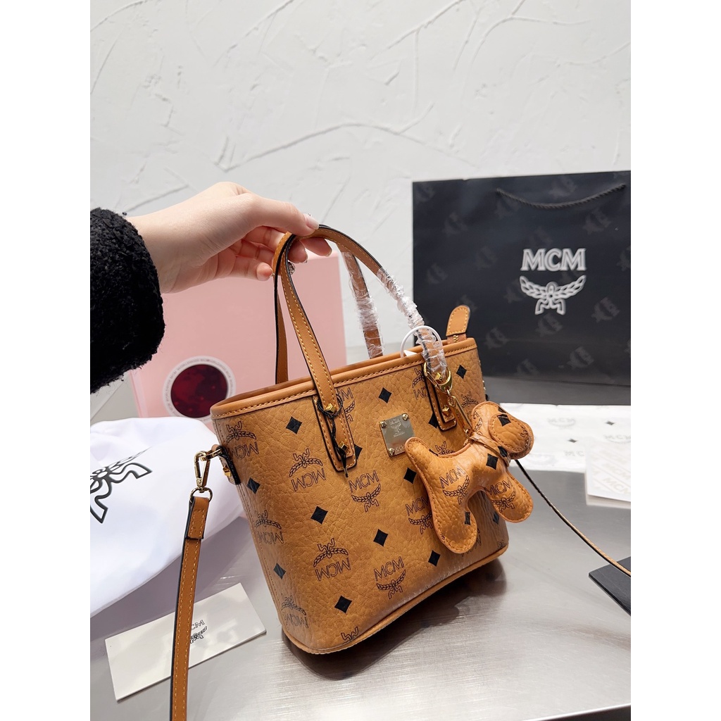 MCM star same dish basket bag fashion trendy essential item metal zipper printed canvas women's bag