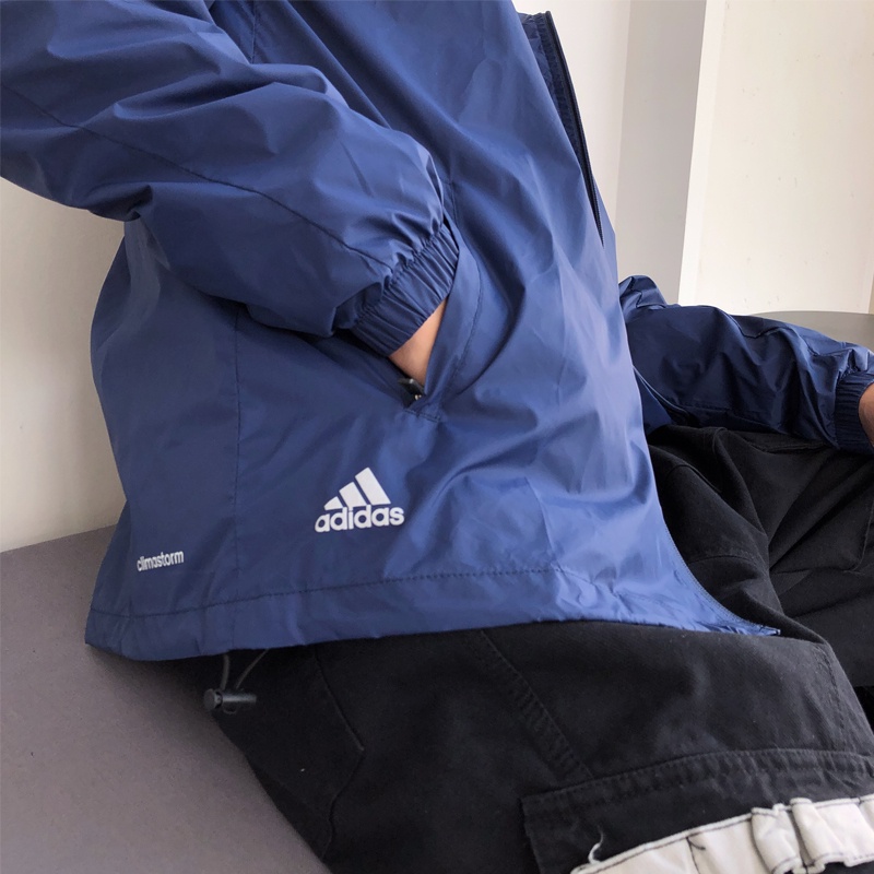 Áo Khoác Gió adidas Chính Hãng 100% Phối Lưới Có Nón Trùm Phối Khóa Kéo Cá Tính Cho Nam Và Nữ