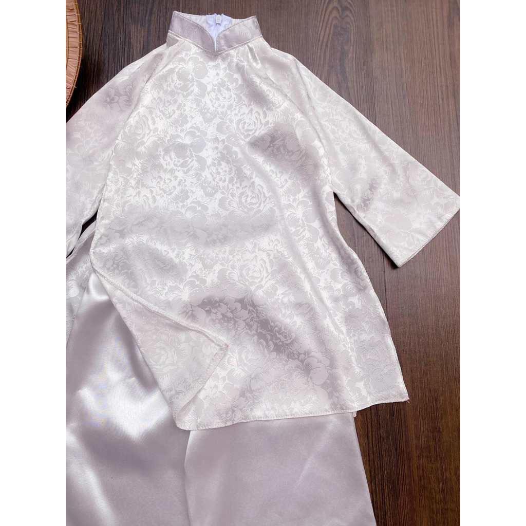Bộ đồ áo dài trắng tay dài vải lụa gấm cho em bé gái size 9-27kg