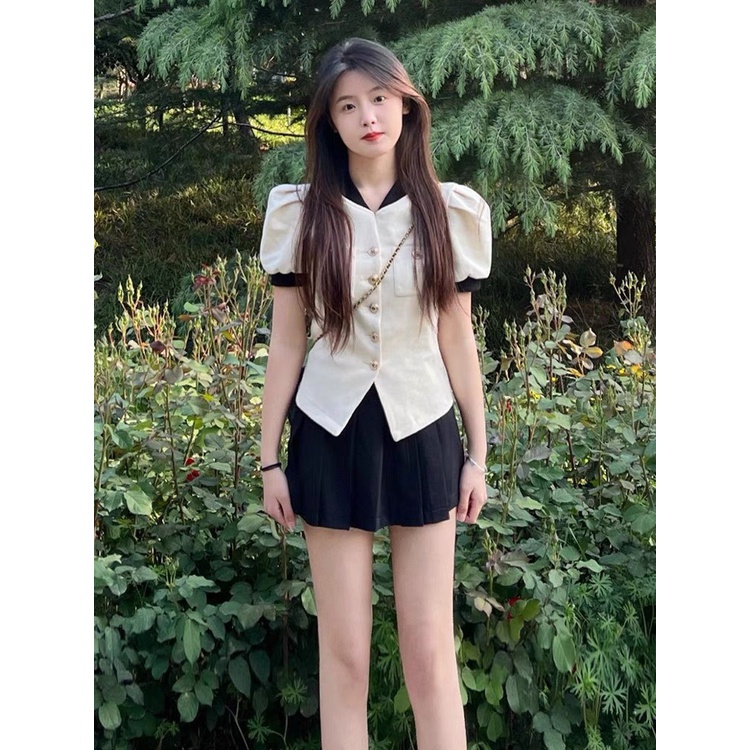 Set dạ nút trắng viền đen +chân váy xếp