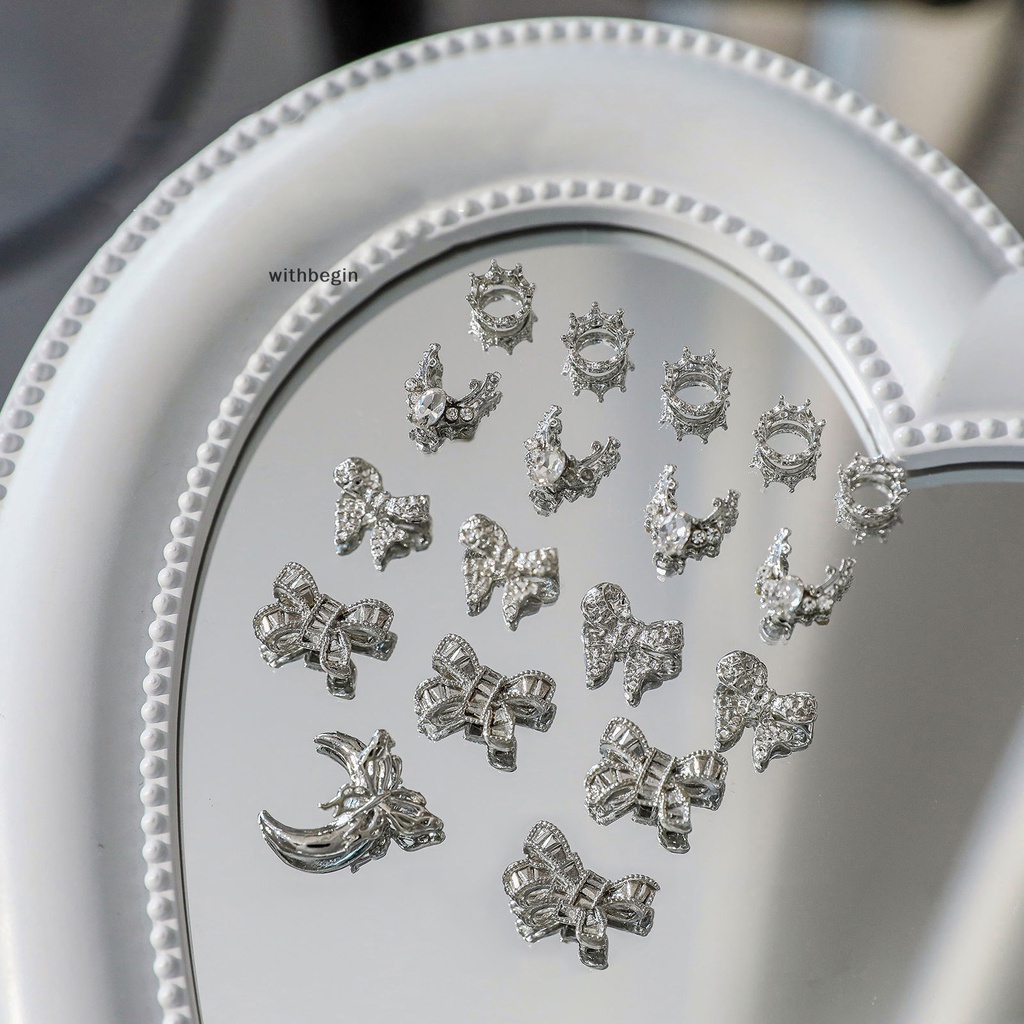 Bộ 5 Phụ Kiện Trang Trí Móng Tay Hình Nơ Đính Đá 3d Bằng Hợp Kim Màu Bạc Xinh Xắn