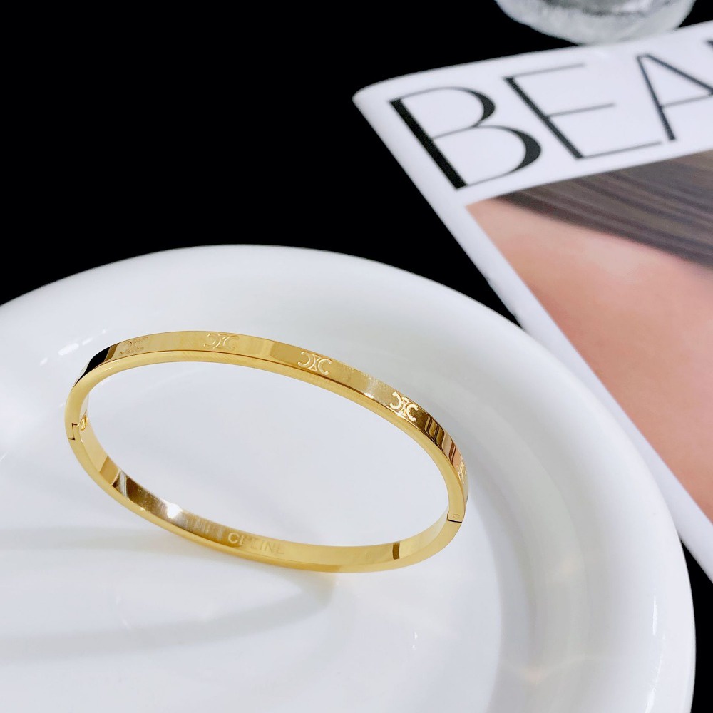 Triumph Vòng Tay Thép Titan Mạ Vàng In Chữ Đơn Giản Dễ Phối Đồ Thời Trang Cho Nữ