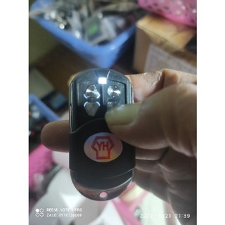 # Tay điều khiển cửa cuốn YH mã gạt 433 mhz Wintec đèn đỏ 8 mã gạt