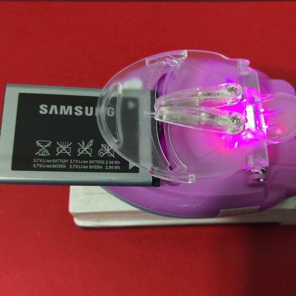 Thiết bị Sạc Kẹp Pin Đa Năng,Sạc được Cho tất cả các dòng Pin rời dien thoại SMARTPHONE - Hàng Nhập Khẩu