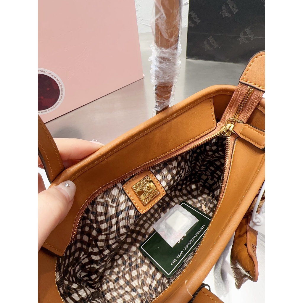 MCM star same dish basket bag fashion trendy essential item metal zipper printed canvas women's bag