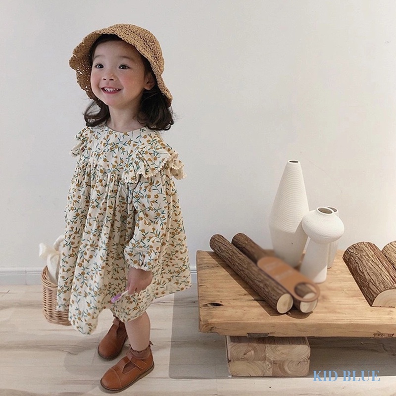 Đầm Bé Gái In Hoa Phối Bèo Màu Vàng