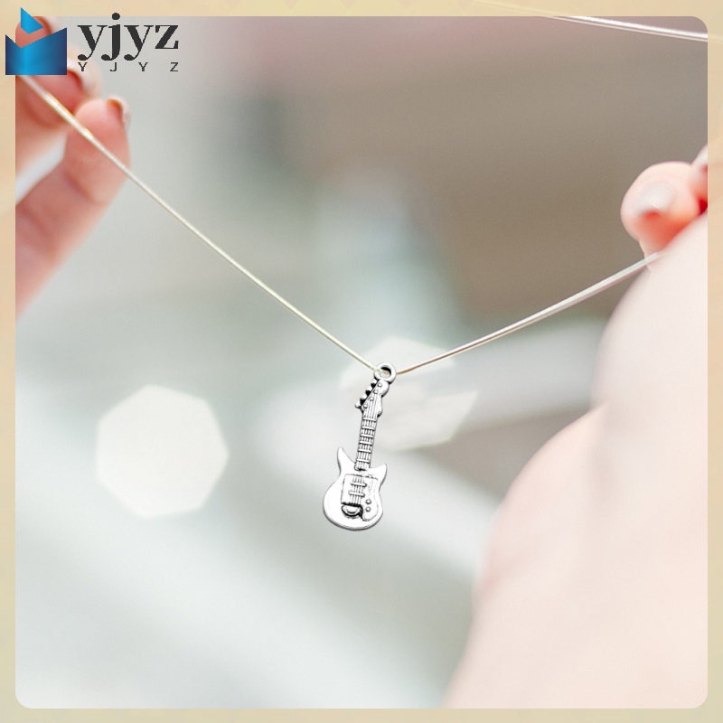 Set 20 Miếng Gảy Đàn Ghita Kèm Giá Đỡ Đeo Tay Trang Sức Dành Cho Nam