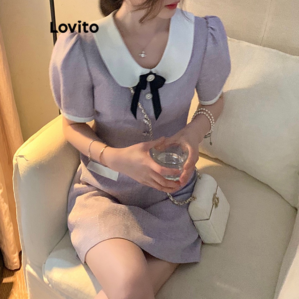 Đầm Lovito tay phồng cổ tương phản đính nơ phối túi giả màu trơn thường ngày cho nữ LNA17158