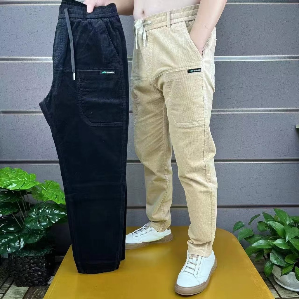 Quần Dài Dáng Ôm Vải Nhung Kẻ Sọc Phối Nhiều Túi Thời Trang Thu Đông Cho Nam