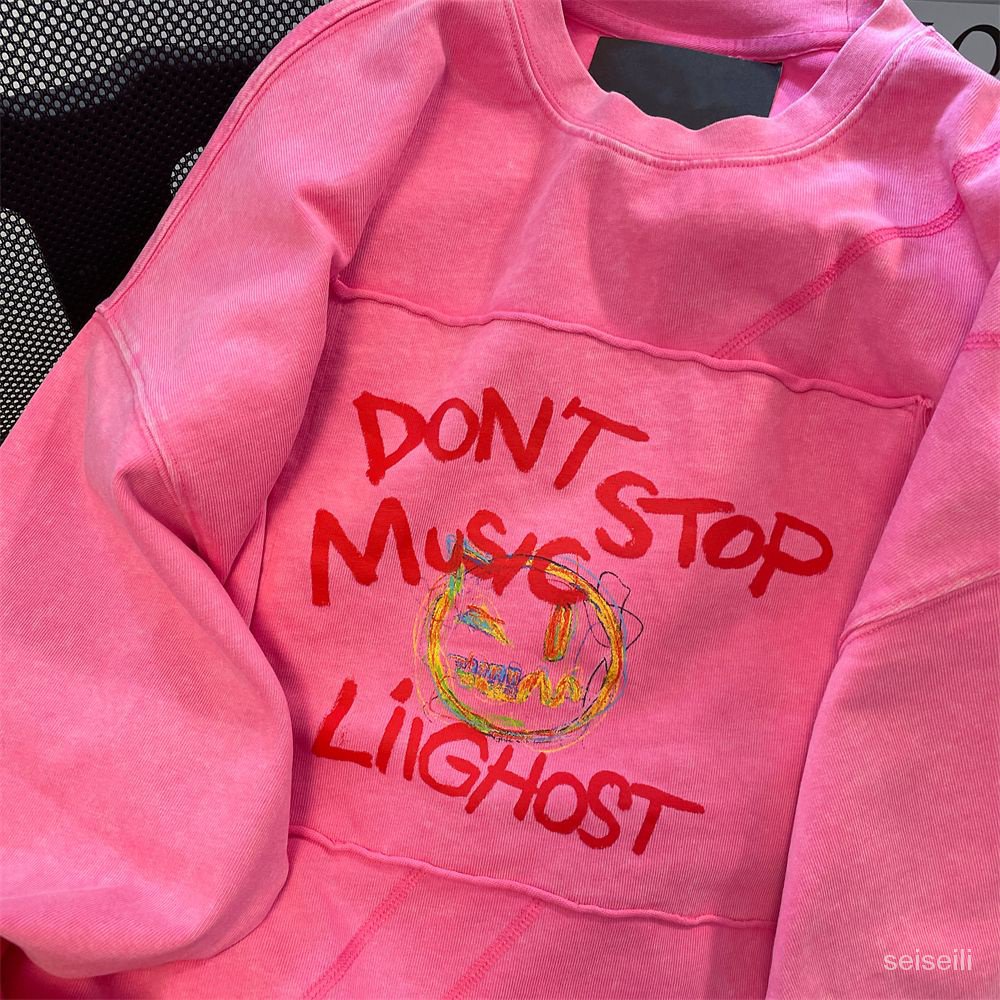 Dragon fruit color European and American Graffiti smiley face letter sweater women's spring and autumn loose national tide oversize off-shoulder top