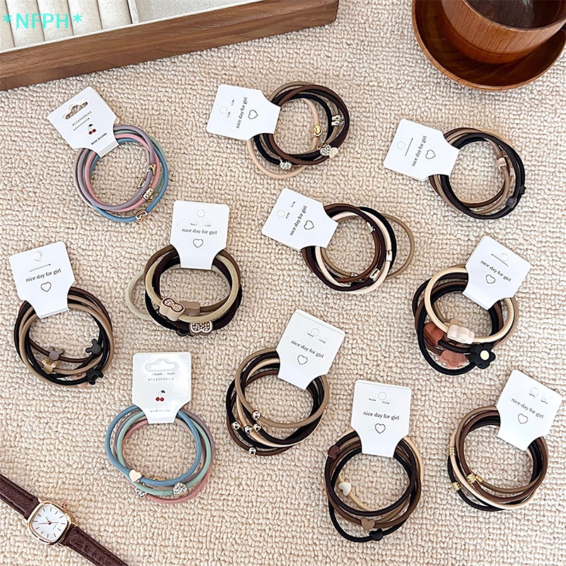 Bộ 5 Dây Buộc Tóc Cao Su Co Giãn Họa Tiết Kẻ Sọc Màu Nâu Sữa Xinh Xắn Cho Nữ Mới