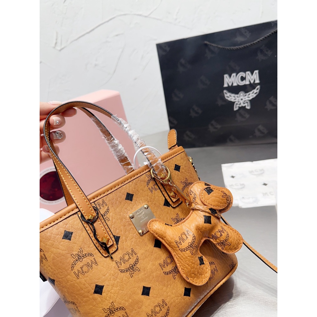 MCM star same dish basket bag fashion trendy essential item metal zipper printed canvas women's bag
