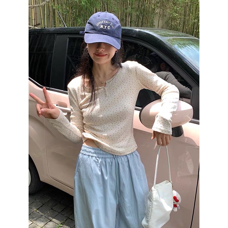 Áo Thun Nữ Tay Dài Cổ Tròn Cài Nút Họa Tiết Hoa Thời Trang Mới