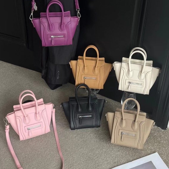 Túi Đeo Chéo Da Bò Hình Mặt Cười Có Cánh Thời Trang Cho Nữ777777