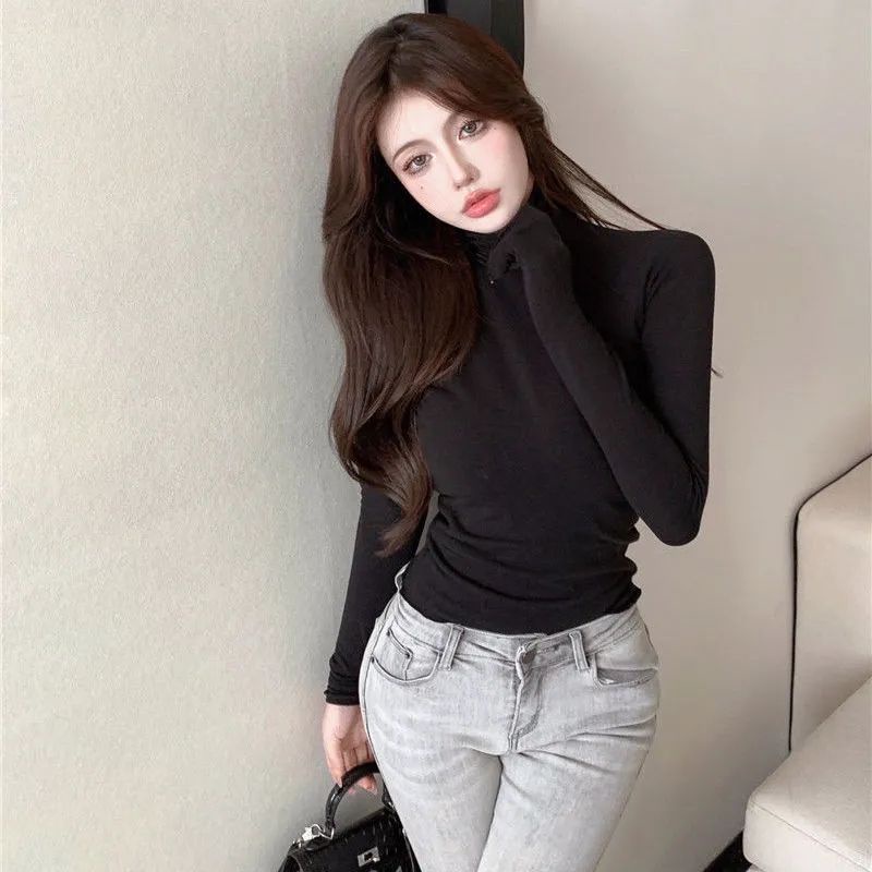 Áo Thun Tay Dài Cổ Cao Hở Lưng Thời Trang Thu Đông Cho Nữ