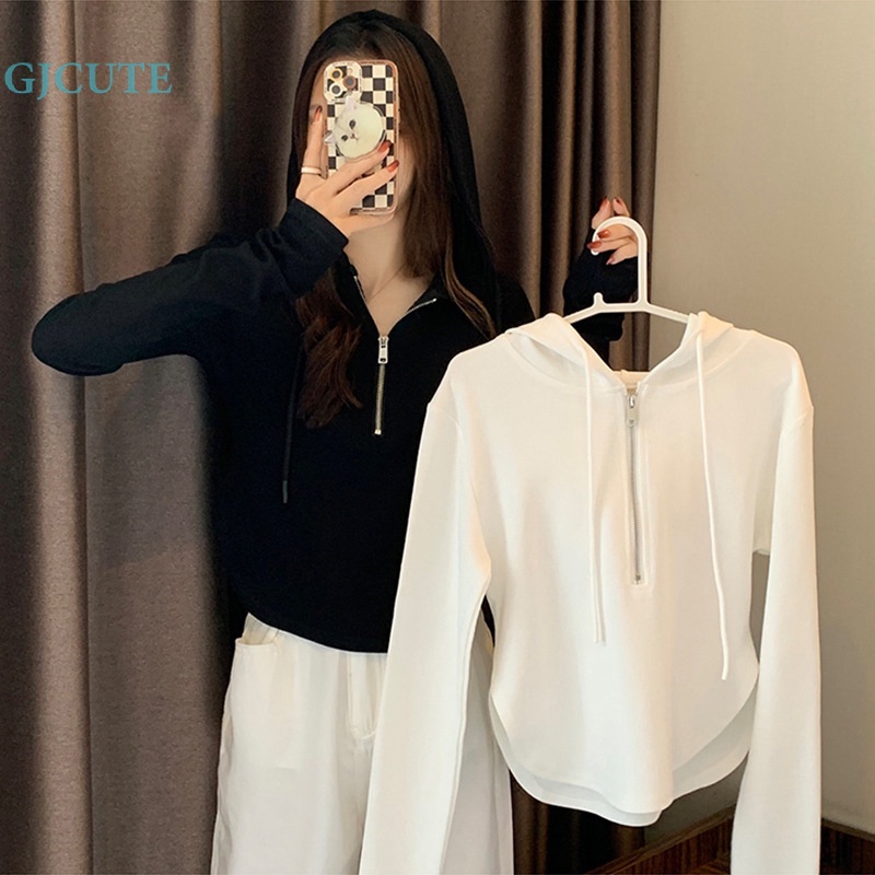 Gjcute Áo crop top Tay Dài Có Nón Nửa Dây Kéo Màu Trơn Không Đều Thời Trang Mùa Thu Cho Nữ wtd