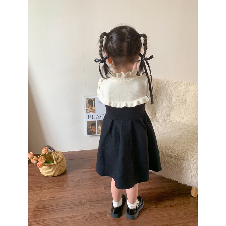 VÁY XÒE LEN CỔ TRẮNG TRÙM VAI ĐÍNH NƠ XINH XẮN CHO BÉ- HÀNG QCCC