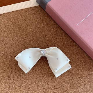 Kẹp Tóc Nơ Đính Đá Hình Trái Tim Lấp Lánh