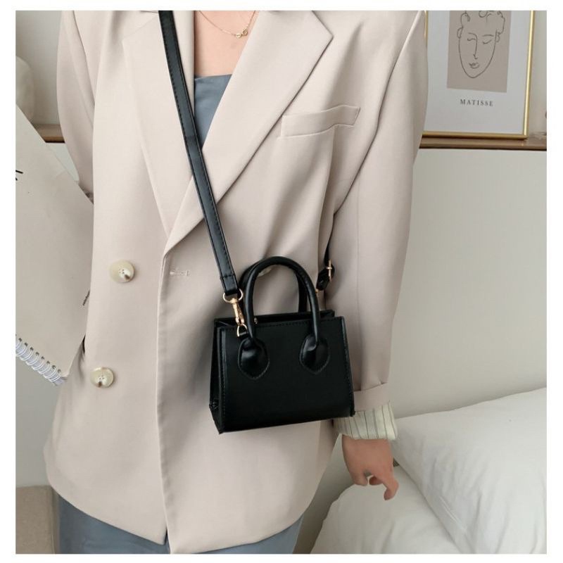 Túi xách nữ đeo chéo da trơn phong cách hàn quốc 2 quai cầm tay.