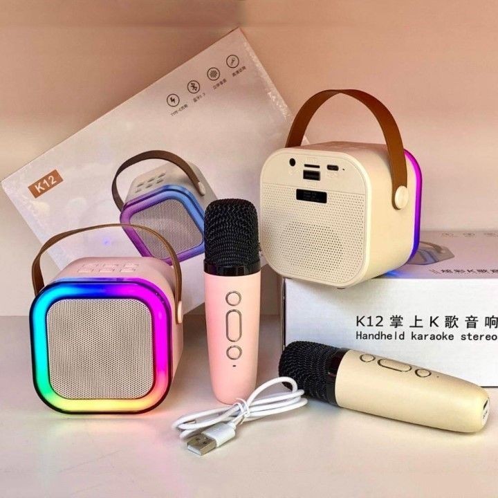 Loa bluetooth mini hát karaoke tặng kèm 2 mic nhỏ  gọn mang theo mọi nơi mic có thể thay đổi giọng