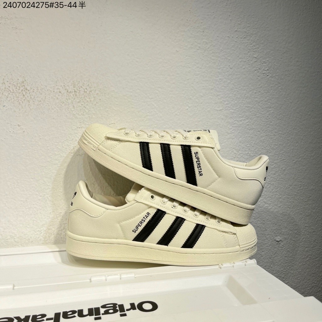 Giày bốt ngắn cổ thấp Adidas Superstar màu trắng / xanh lá cây / xanh lá cây có dây buộc phía trước