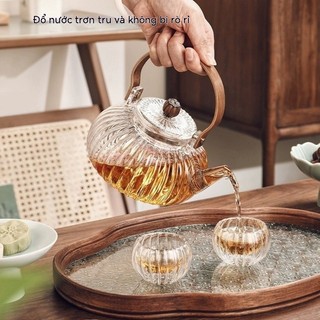  Bán buôn ấm trà hoa thủy tinh ấm trà chùm bộ ấm trà ấm trà ấm trà trái cây nấu trong lò sức khỏe và chịu nhiệt 