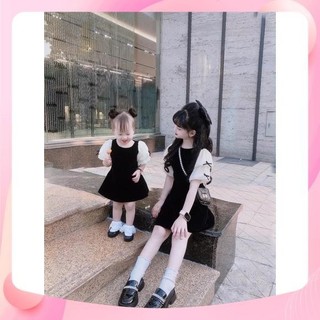 Váy nhung đen phối tay voan đính nơ cho bé gái