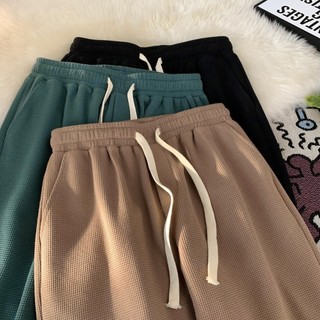 Nam mùa hè 2024 phong cách mới quần áo thể thao quần short rời nam nữ cùng phong cách waffle