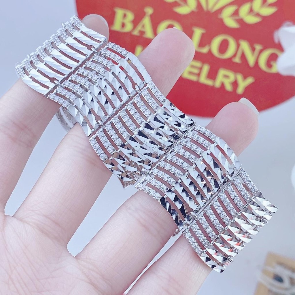 "Lắc tay, vòng tay Ximen bạch kim họa tiết lươn sóng đẹp, bền và có ký hiệu."